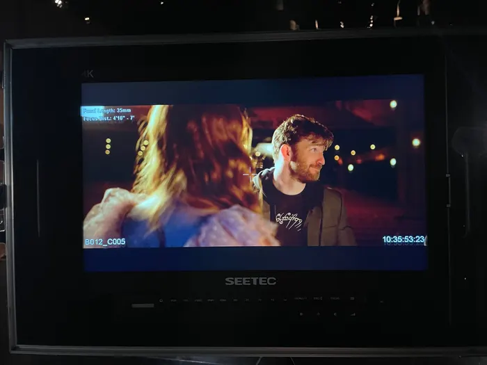 On set at the monitor